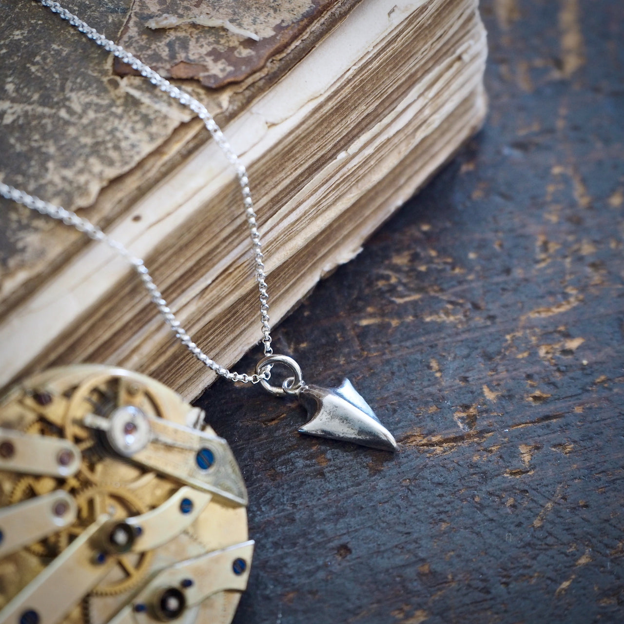 mini arrowhead pendant