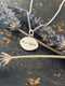 Faithful/traitor pendant