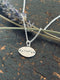 Faithful/traitor pendant